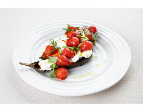 Baked eggplant with stracciatella and cherry tomatoes