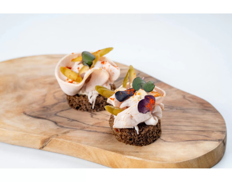 Turkey with vitello tonato sauce, capers and wild garlic