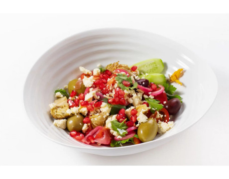 Baked pepper salad with artichokes and Georgian chanakh cheese